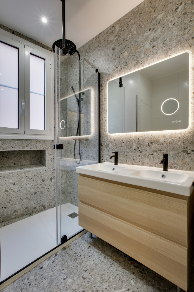 Inspiration for a mid-sized contemporary master bathroom in Paris with an alcove shower, a sliding shower screen, white benchtops, a double vanity, a freestanding vanity, beige cabinets, gray tile, ceramic tile, grey walls, ceramic floors, an undermount sink, solid surface benchtops, grey floor, a laundry and flat-panel cabinets.