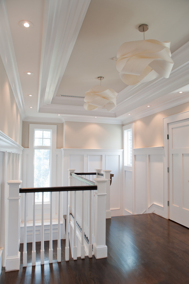 This is an example of a traditional hallway in New York with grey walls.
