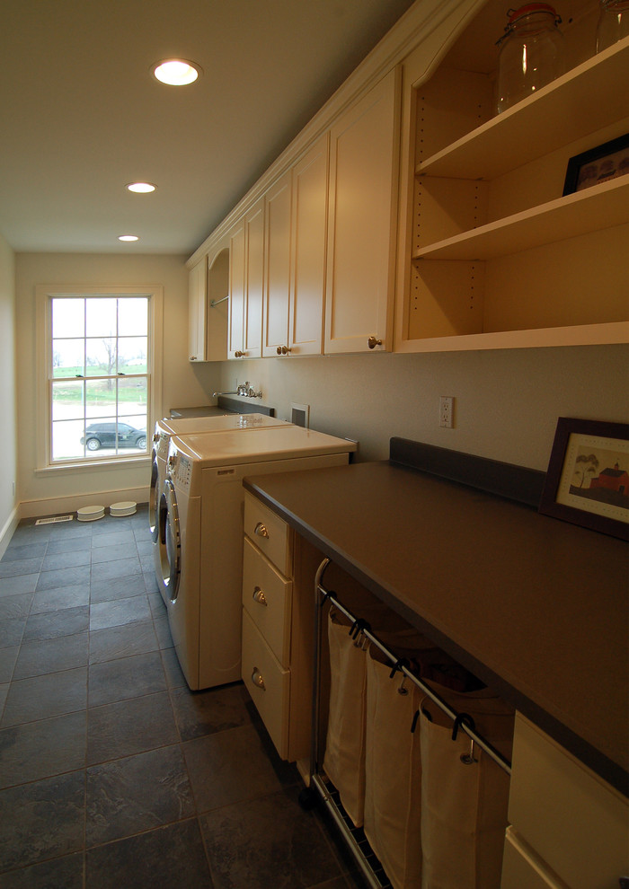 Photo of a traditional laundry room in Other.