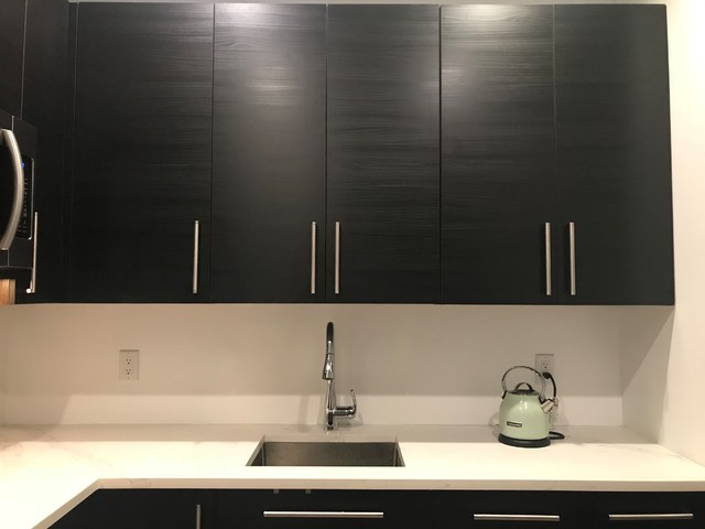 IKEA Tingsryd , custom corner cabinets, custom fridge panels & top cabinet  - Contemporary - Kitchen - New York - by Basic Builders, Inc. | Houzz