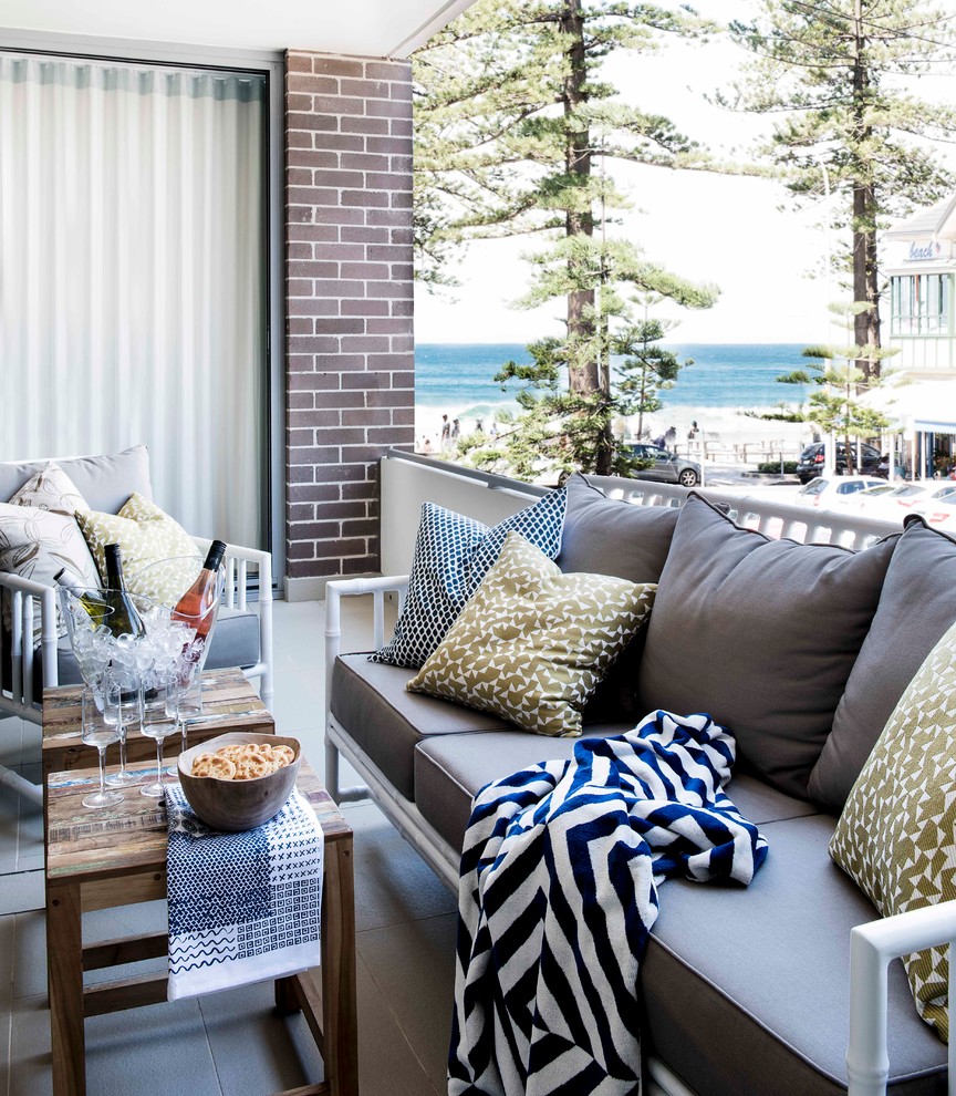 Inspiration for a beach style sunroom in Sydney.
