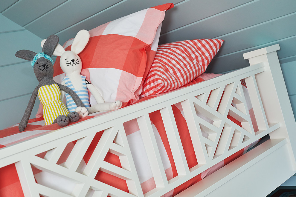 Beach House Bunk Room - In this formerly unfinished room above a garage, we were tasked with creating the ultimate kids’ space that could easily be used for adult guests as well. Our space was limited, but our client’s imagination wasn’t! Bold, fun, summertime colors, layers of pattern, and a strong emphasis on architectural details make for great vignettes at every turn.

With many collaborations and revisions, we created a space that sleeps 8, offers a game/project table, a cozy reading space, and a full bathroom. The game table and banquette, bathroom vanity, locker wall, and unique bunks were custom designed by Bayberry Cottage and all allow for tons of clever storage spaces.

This is a space created for loved ones and a lifetime of memories of a fabulous lakefront vacation home!