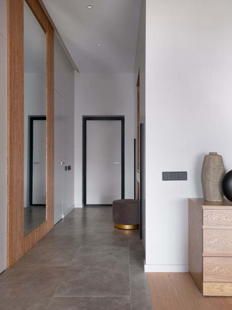 Монохром с деревянными акцентами в двухкомнатной квартире 60 м2