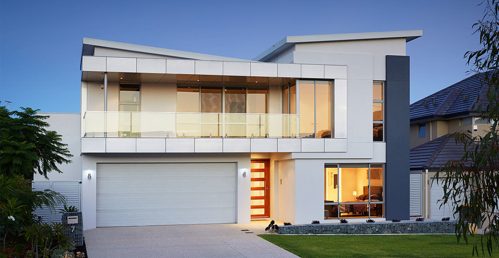 This is an example of a contemporary two-storey white house exterior in Perth with a shed roof.