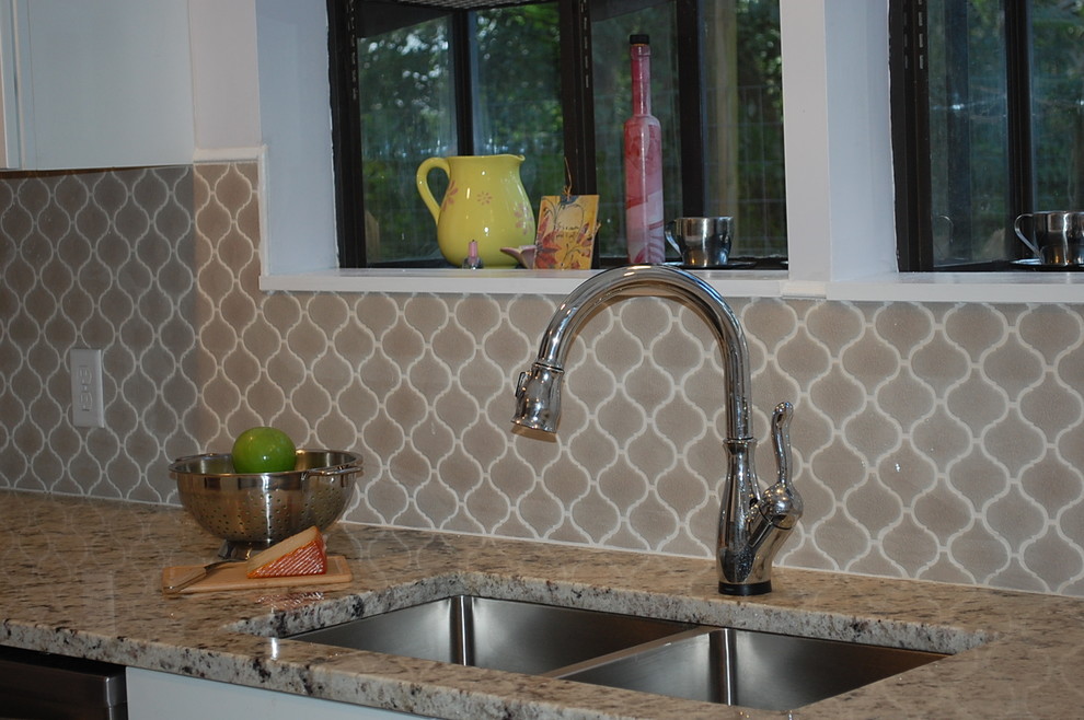 Transitional galley enclosed kitchen photo in Jacksonville with shaker cabinets, white cabinets, gray backsplash and cement tile backsplash
