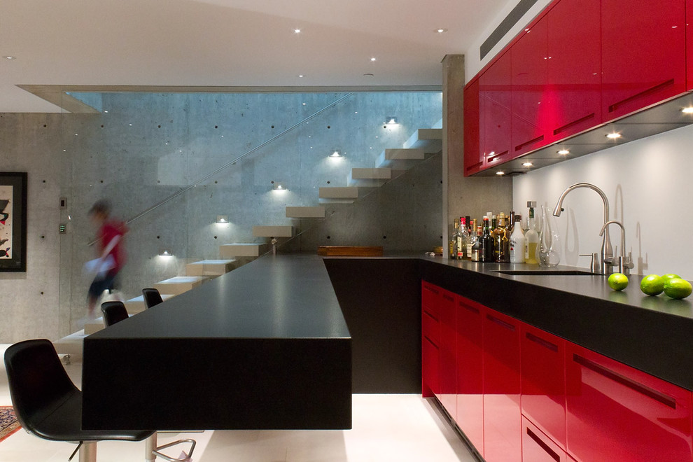 Contemporary home bar in Vancouver with white floor.