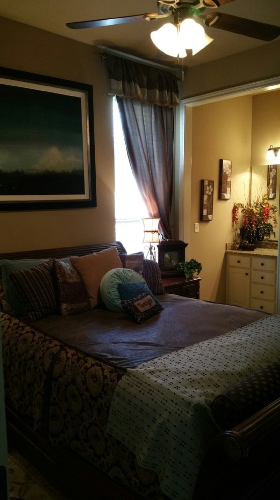 This is an example of an eclectic bedroom in Austin.