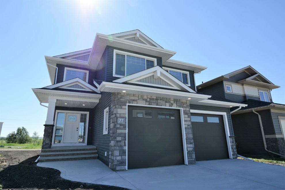 Transitional home design photo in Calgary