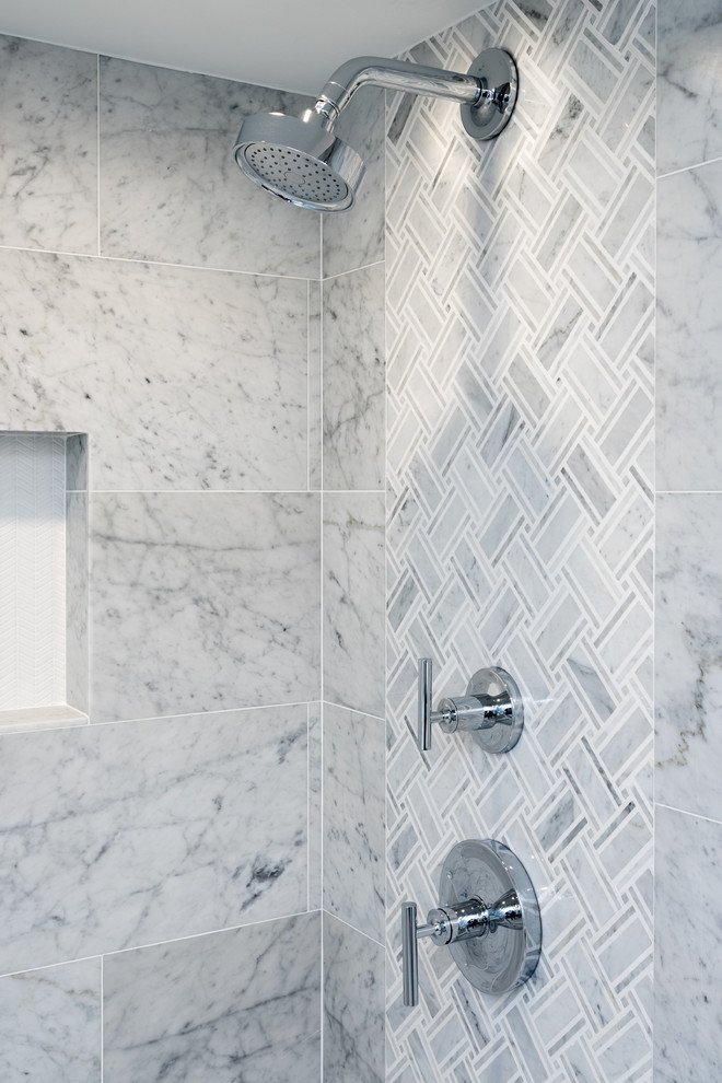 Design ideas for a transitional bathroom in Miami with gray tile.