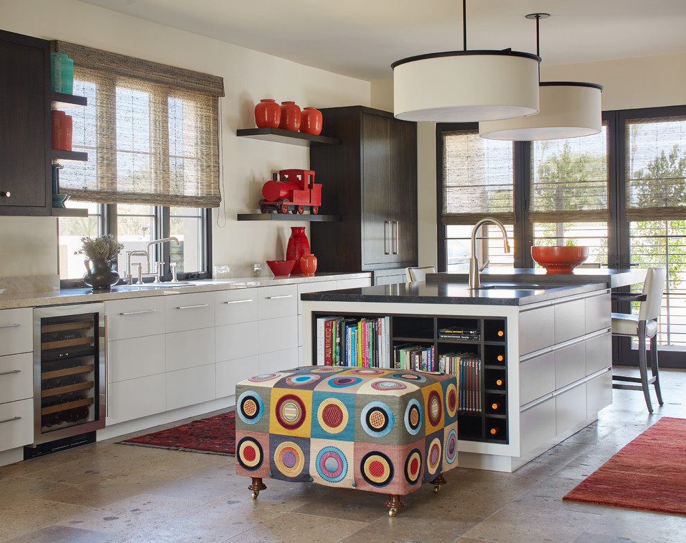 Transitional galley beige floor kitchen photo in Phoenix with an undermount sink, flat-panel cabinets, dark wood cabinets, beige backsplash, an island and beige countertops
