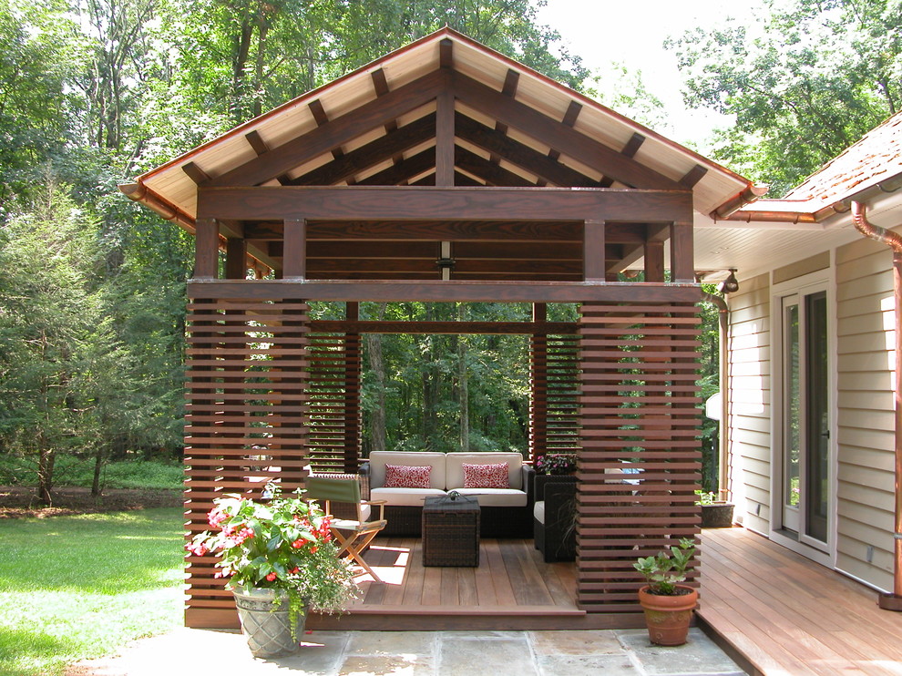 Inspiration for a traditional backyard deck in Other.