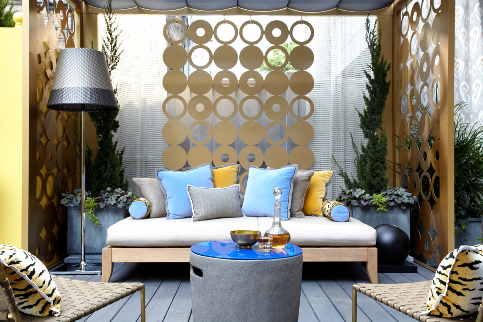 Photo of an eclectic patio in New York with a gazebo/cabana.