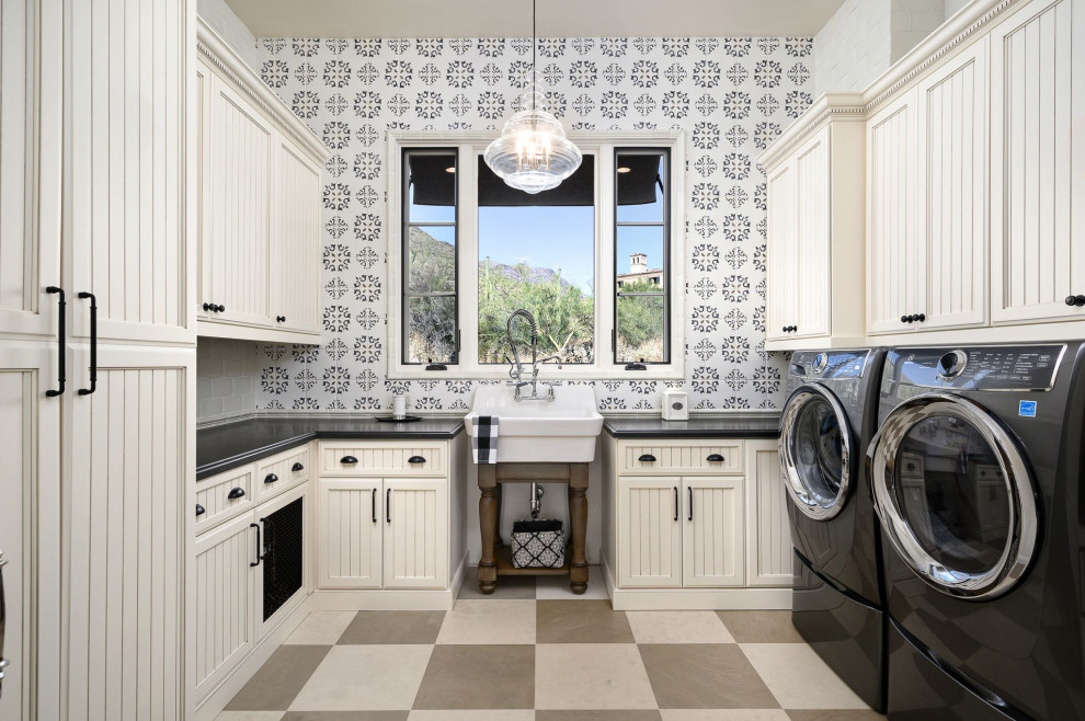Inspiration for a mediterranean laundry room in Phoenix.
