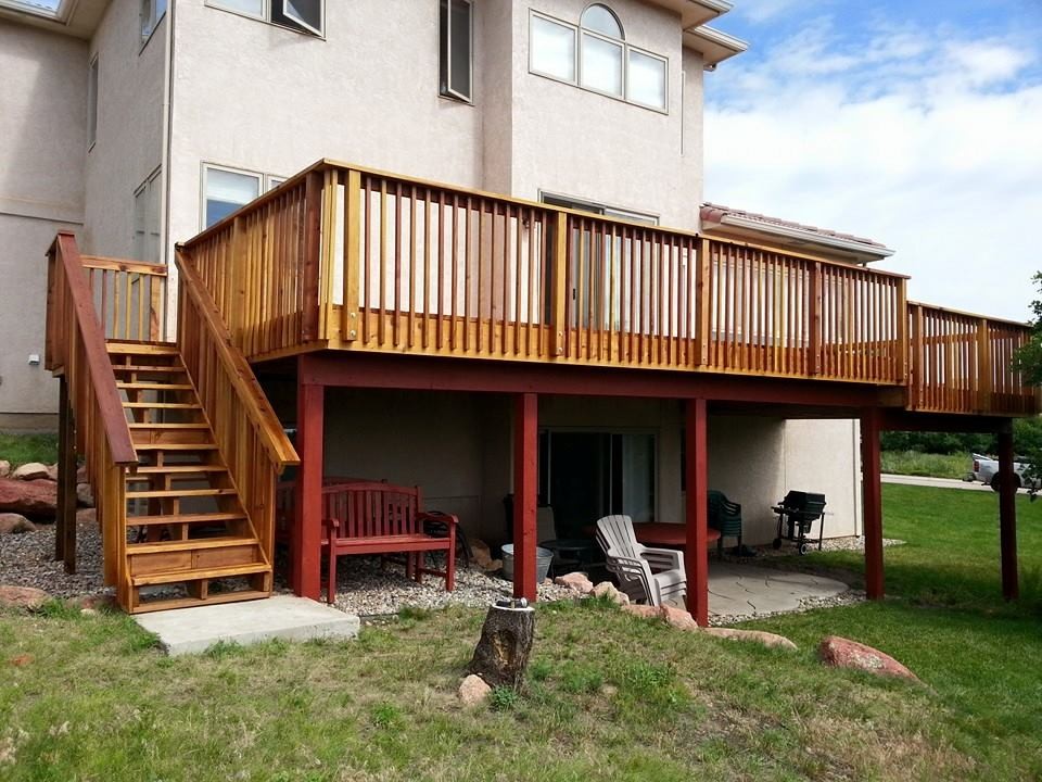 Deck - large transitional backyard deck idea with no cover