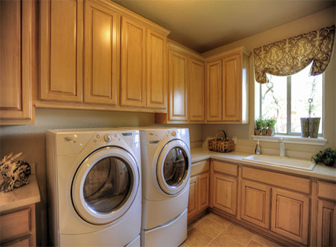 Inspiration for a timeless laundry room remodel in Austin
