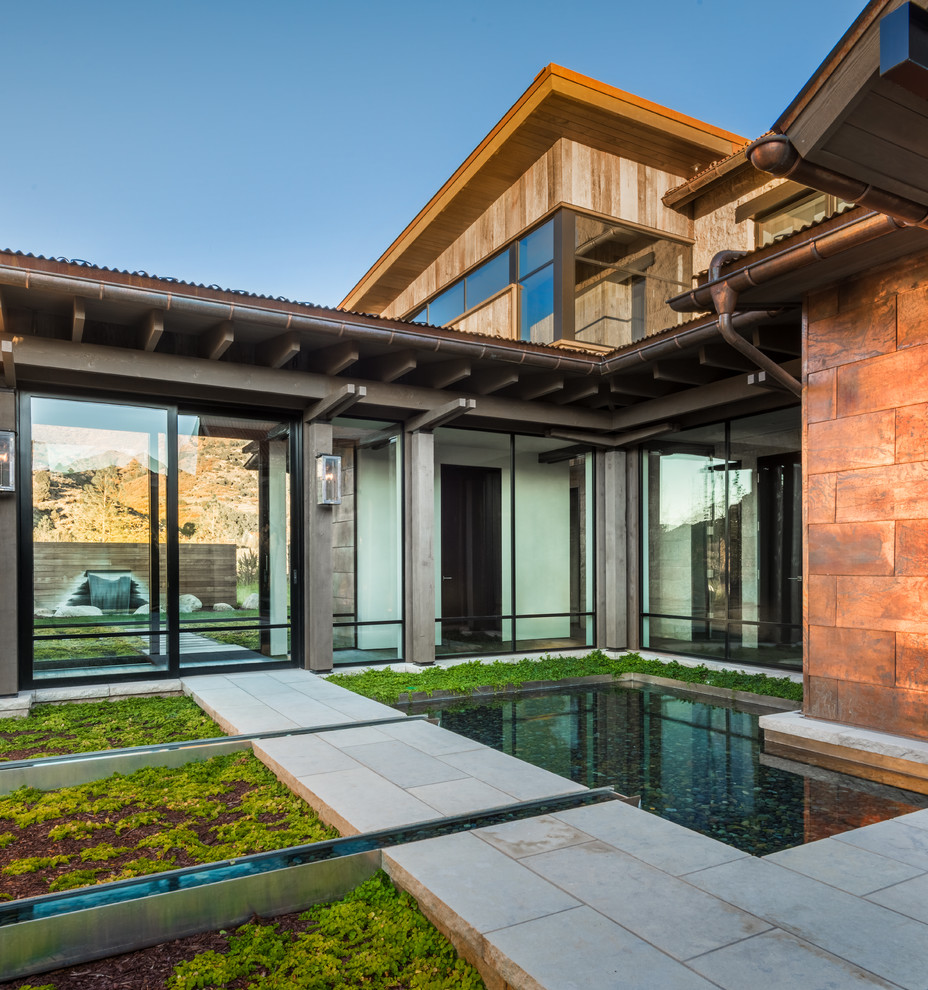 Inspiration for a rustic home design remodel in Denver