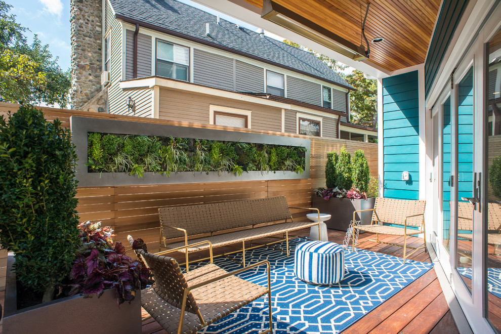 Photo of a contemporary deck in Detroit with a vertical garden.