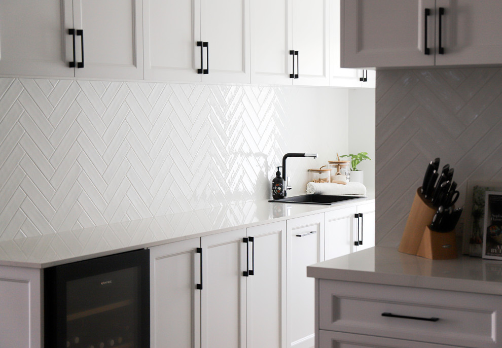 Inspiration for a large transitional galley utility room in Perth with a single-bowl sink, shaker cabinets, white cabinets, quartz benchtops, white walls, an integrated washer and dryer and white benchtop.