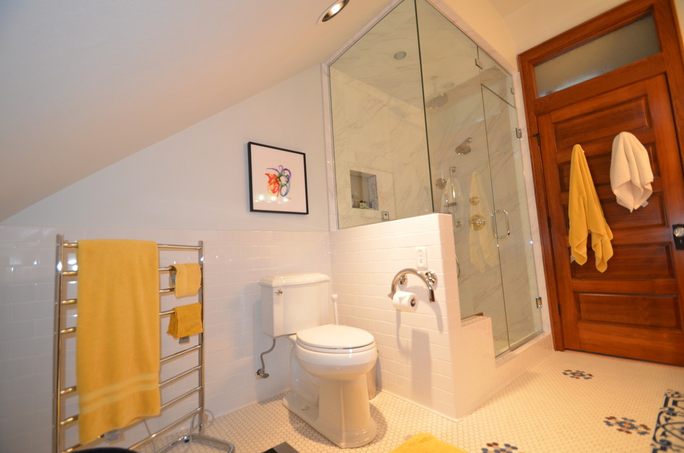 Bathroom - small transitional master white tile and ceramic tile ceramic tile bathroom idea with recessed-panel cabinets, dark wood cabinets, a two-piece toilet, white walls, an undermount sink and quartz countertops