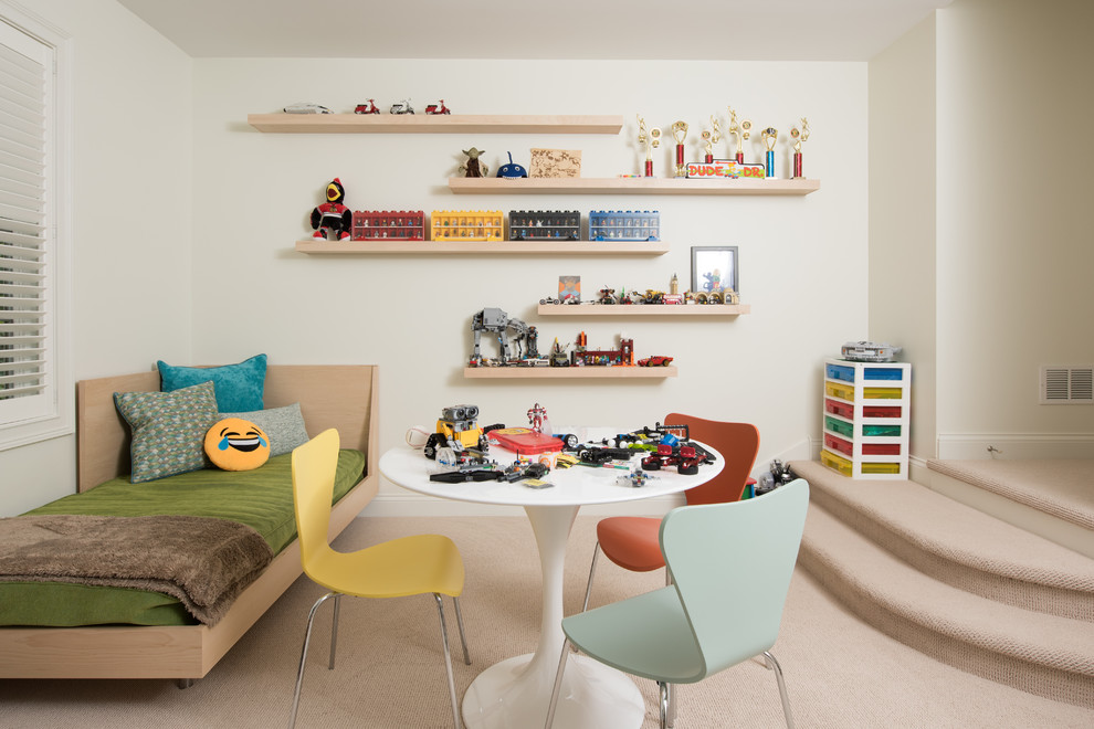 Photo of a midcentury kids' bedroom for kids 4-10 years old and boys in Chicago with white walls, carpet and beige floor.