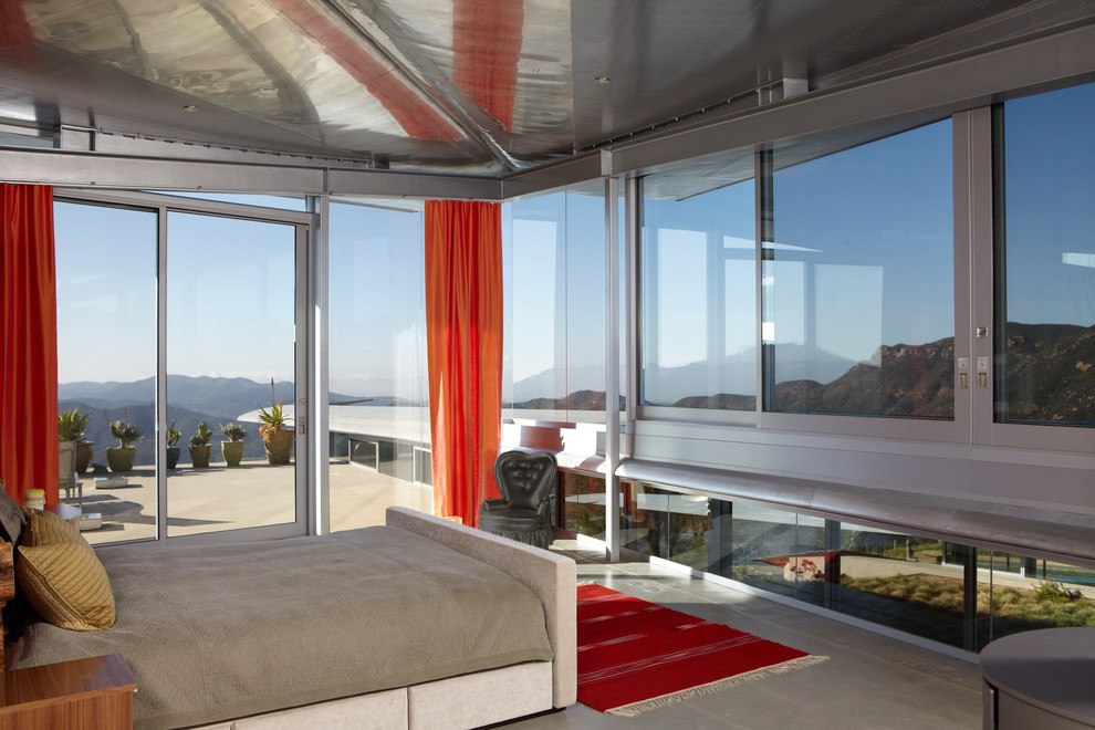Design ideas for a contemporary bedroom in Los Angeles with concrete floors.