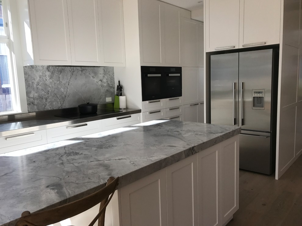 This is an example of a transitional kitchen in Sydney.