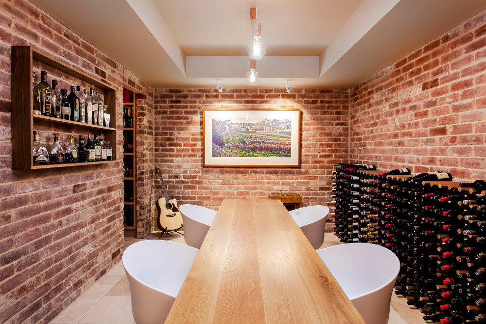 Design ideas for a large transitional wine cellar in Adelaide with storage racks and beige floor.