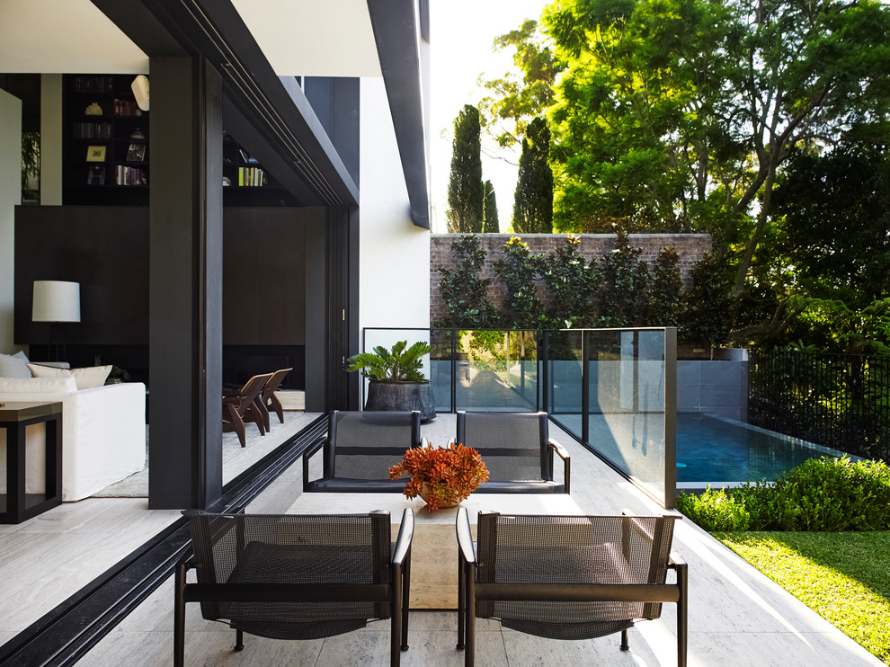 Contemporary patio in Sydney with no cover.