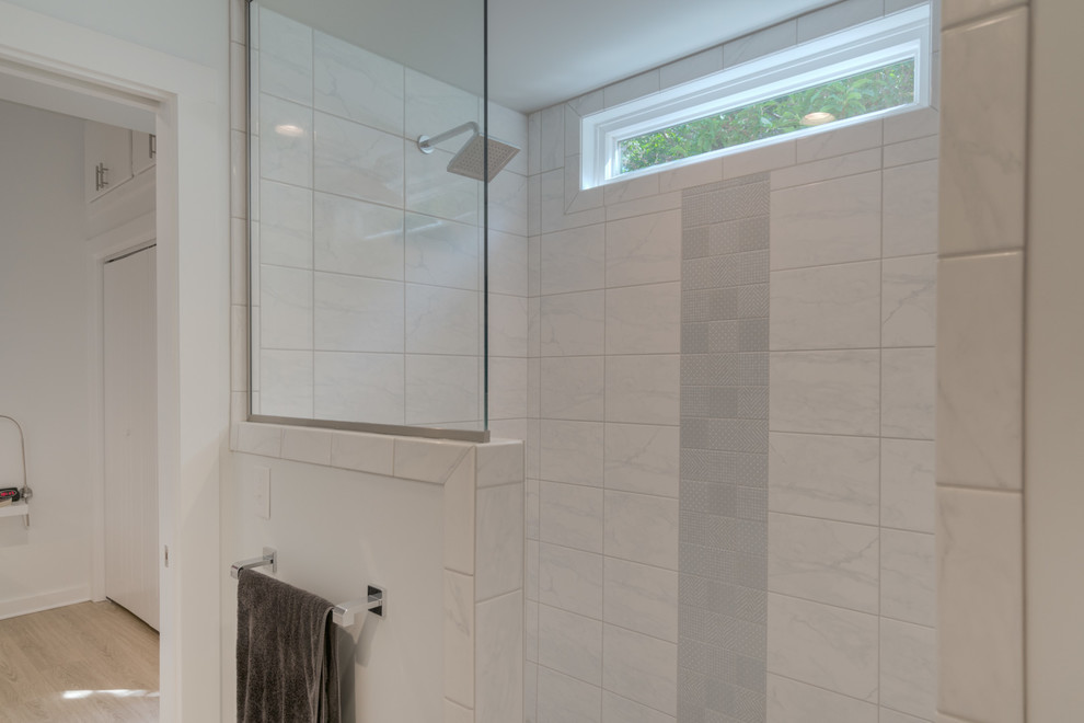 Small modern master bathroom in Other with flat-panel cabinets, white cabinets, an open shower, a two-piece toilet, white tile, white walls, vinyl floors, an undermount sink, engineered quartz benchtops, beige floor and an open shower.