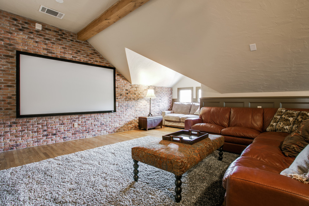 Mid-sized traditional enclosed home theatre in Dallas with white walls, light hardwood floors and a projector screen.