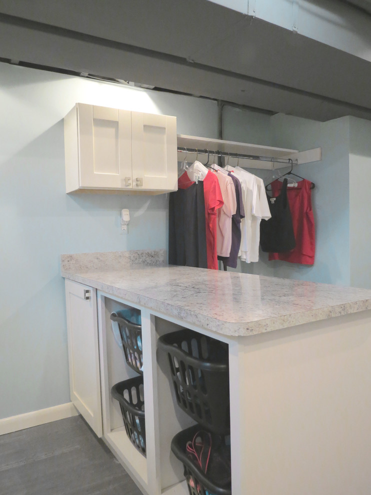 This is an example of a contemporary laundry room in Detroit.