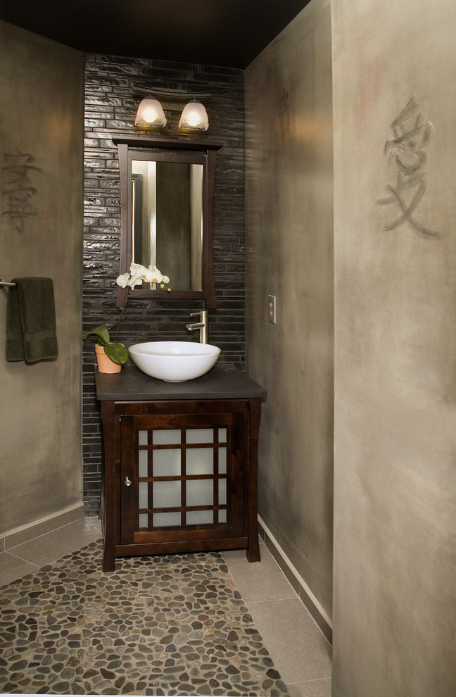 Small asian bathroom in Seattle with a vessel sink, dark wood cabinets, engineered quartz benchtops, brown tile, ceramic tile, beige walls, pebble tile floors and a freestanding vanity.