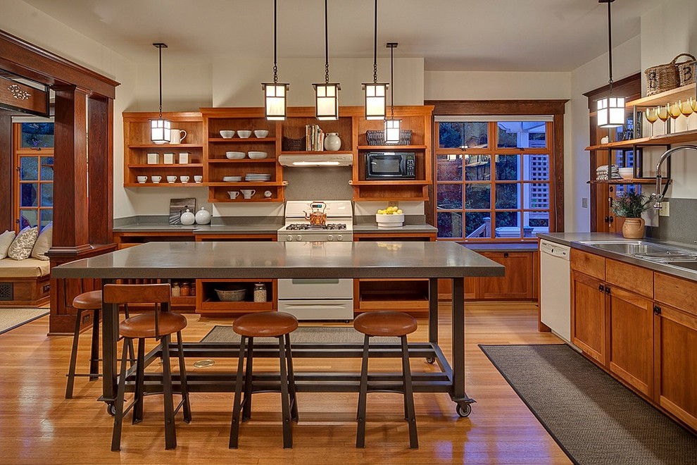 This is an example of a traditional kitchen in Seattle with white appliances.