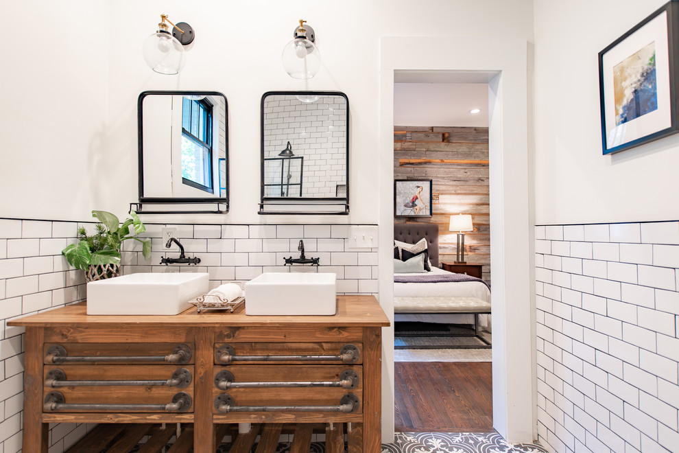 This is an example of a mid-sized transitional master bathroom in Atlanta with medium wood cabinets, a double shower, a two-piece toilet, white tile, subway tile, white walls, mosaic tile floors, a vessel sink, wood benchtops, grey floor, an open shower and brown benchtops.
