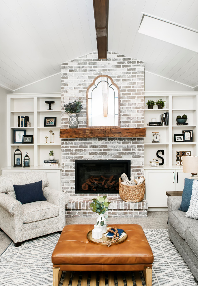 Medium sized rural open plan games room in Denver with grey walls, carpet, a standard fireplace, a brick fireplace surround, a freestanding tv, grey floors and a timber clad ceiling.