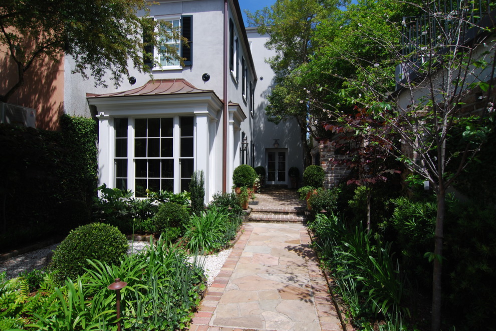 This is an example of a traditional side yard garden in Charleston.
