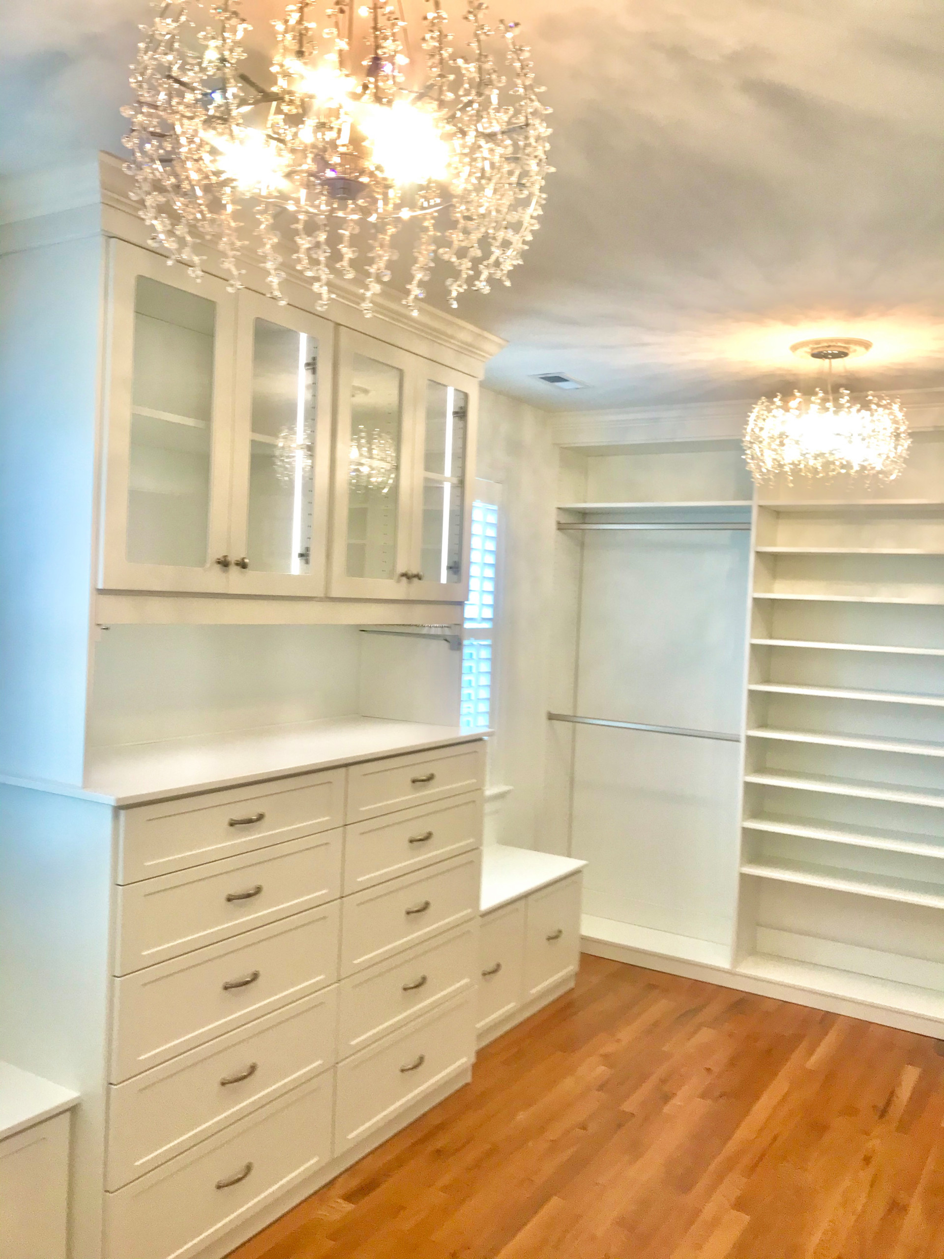 Lighted White Dressing Room with Chandeliers