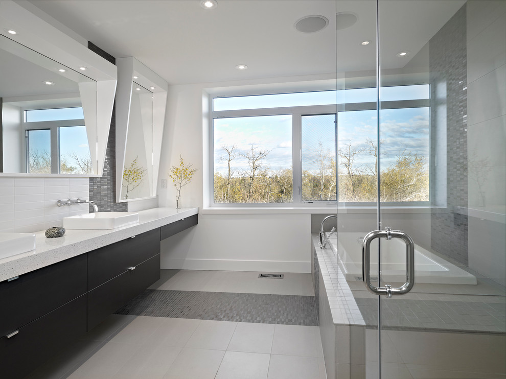 Inspiration for a contemporary bathroom in Edmonton with a vessel sink.