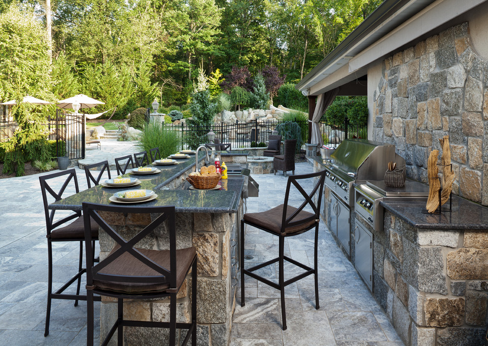 Huge tuscan backyard stone patio photo in New York with no cover and a bbq area