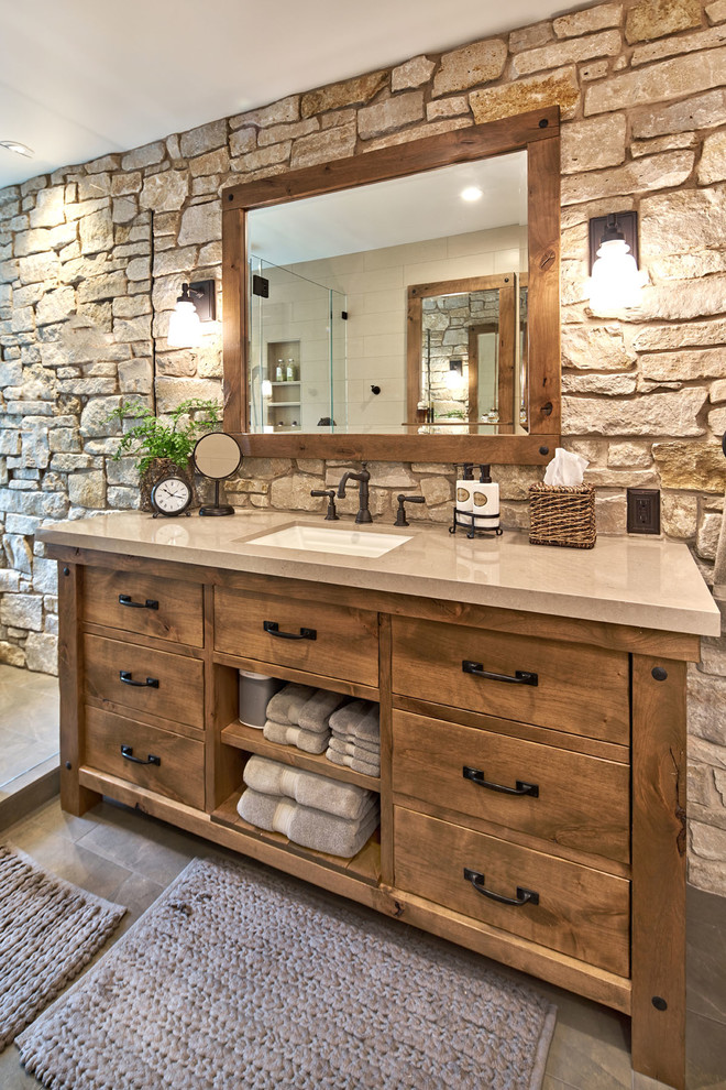 This is an example of a modern bathroom in San Francisco with medium wood cabinets.