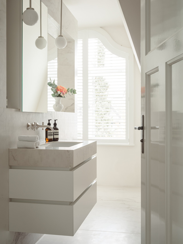 Bathroom - small contemporary 3/4 white tile and ceramic tile ceramic tile, white floor and single-sink bathroom idea in Frankfurt with white cabinets, solid surface countertops, white countertops and a floating vanity