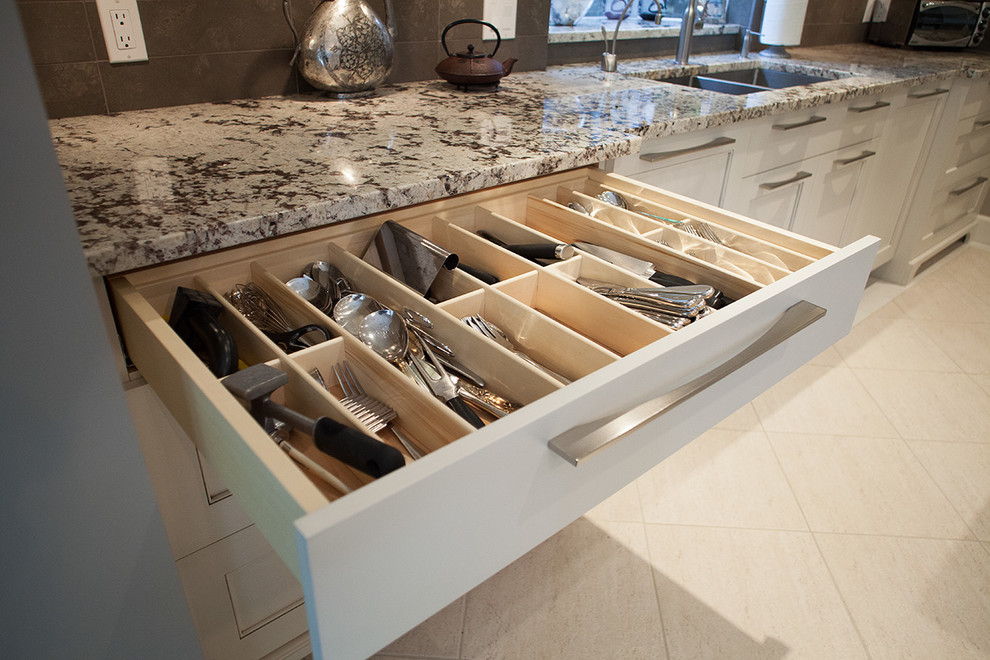 Example of a transitional home design design in Vancouver