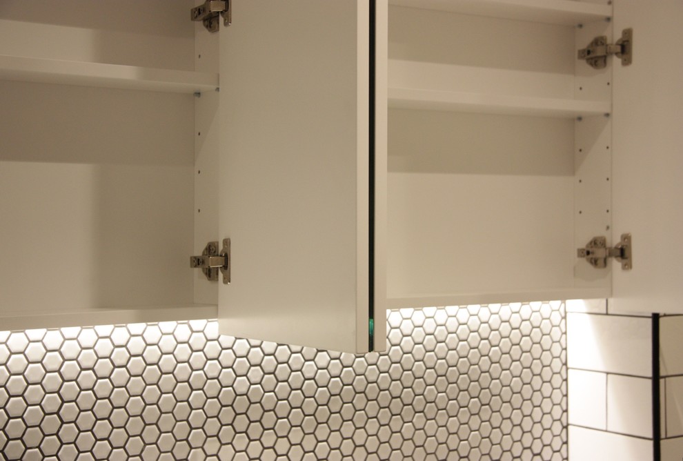 Spray painted vanity unit with mirrored hinged doors