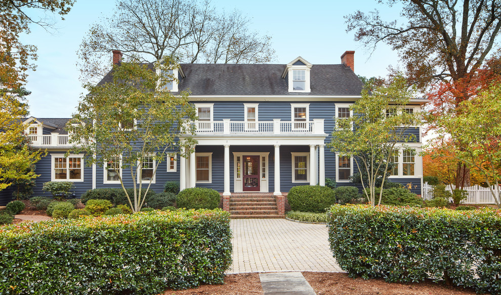 Inspiration for a timeless blue two-story gable roof remodel in DC Metro