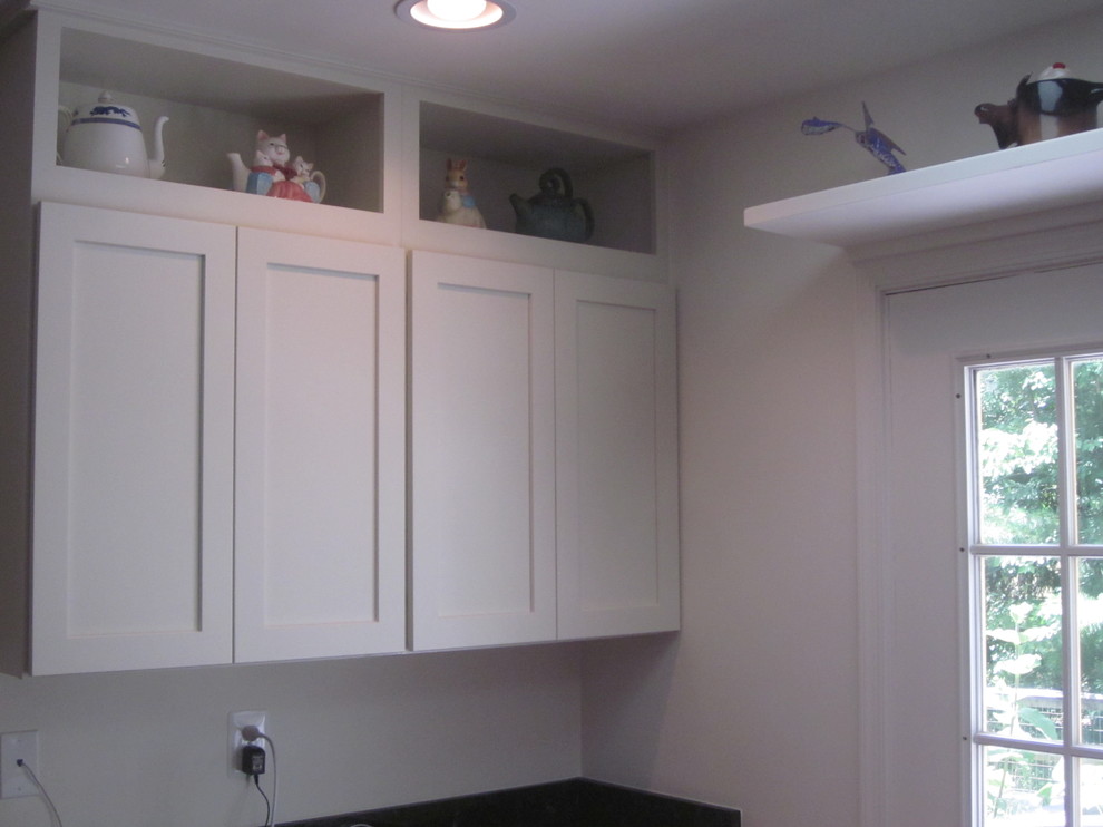 Example of a trendy home design design in Baltimore