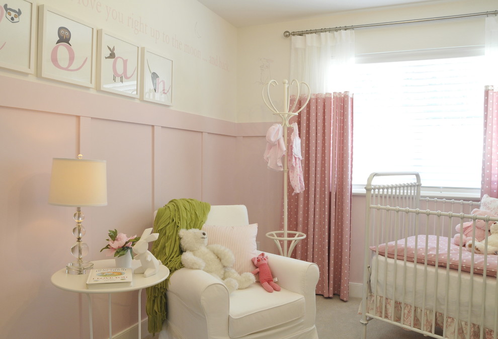 Design ideas for a mid-sized traditional nursery for girls in Vancouver with pink walls, carpet and grey floor.