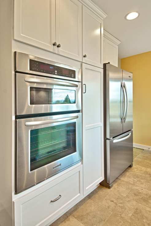 Example of a transitional kitchen design in Seattle