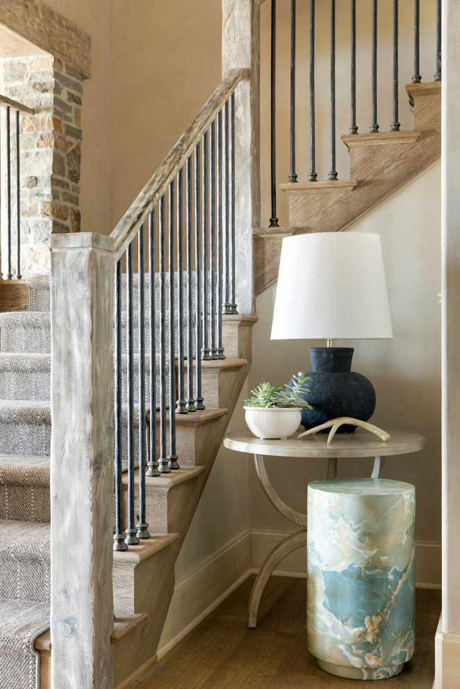 Design ideas for a mid-sized country wood l-shaped staircase in Minneapolis with wood risers, mixed railing and brick walls.