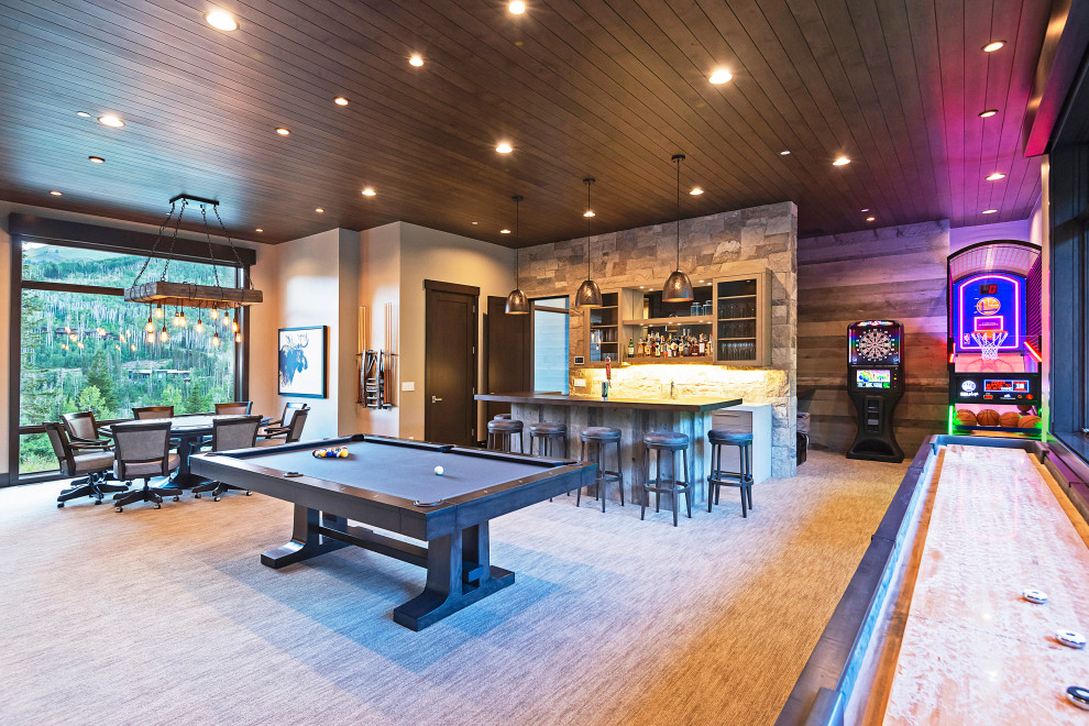 This is an example of a country family room in Salt Lake City with a game room, grey walls, carpet and grey floor.