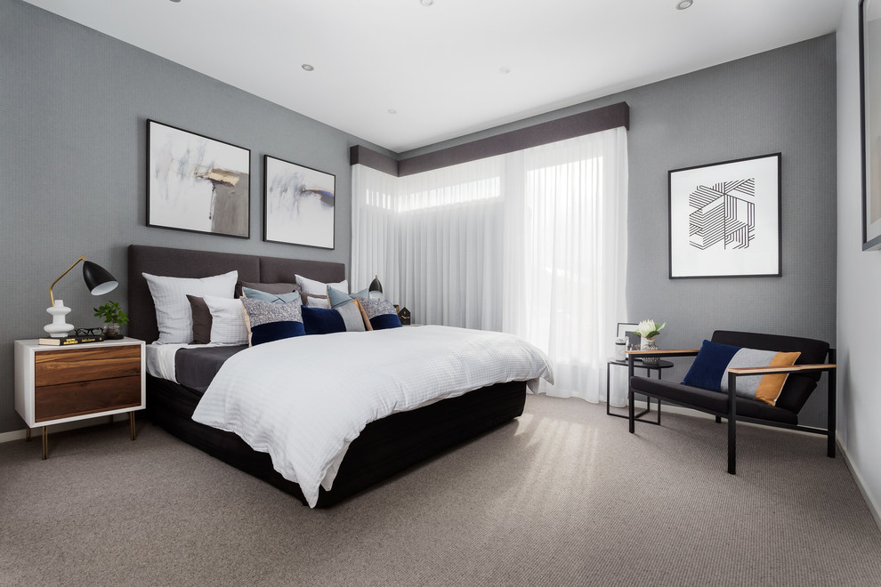 Photo of a contemporary master bedroom in Melbourne with grey walls, carpet and grey floor.